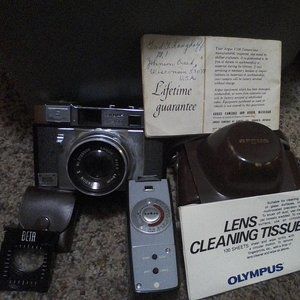 Argued camera with  case and add ons